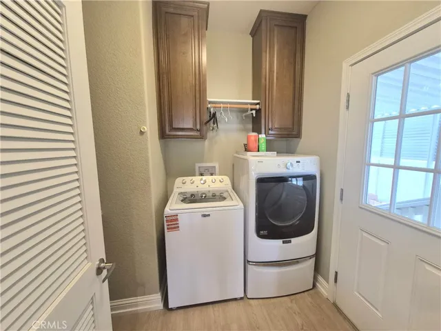 Washer & Drier included - indoor laundryroom perfectly located at side door to carport.