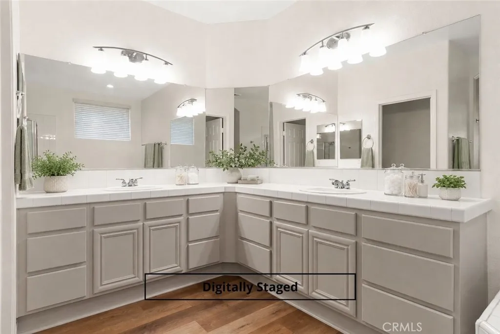 Expansive primary bath has a recent glow up + double vanities and sinks - so much counter space! Expansive primary bath has a recent glow up + double vanities and sinks - so much counter space!