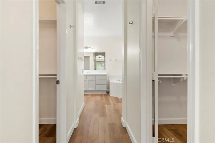 Dual walk in closets in the primary bedroom
