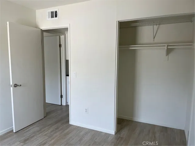 second bedroom is also has vinyl flooring