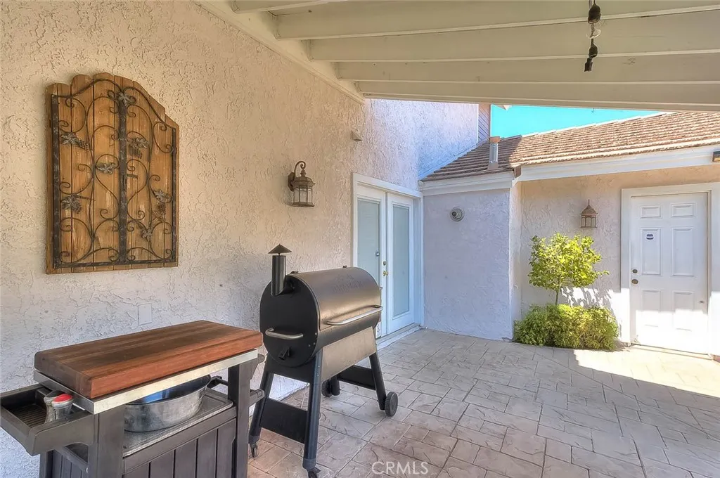 Backyard access from bedroom one & garage Backyard access from bedroom one & garage