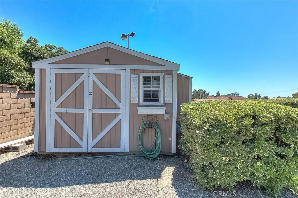 Storage shed at end of RV driveway will remain Storage shed at end of RV driveway will remain