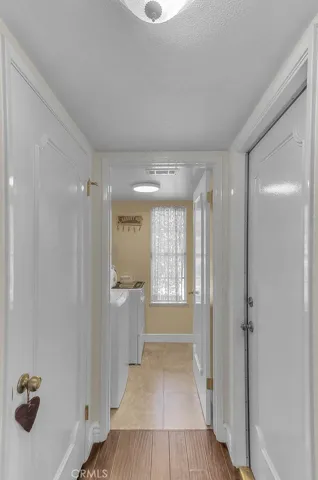 Door from garage leads to closet & laundry area