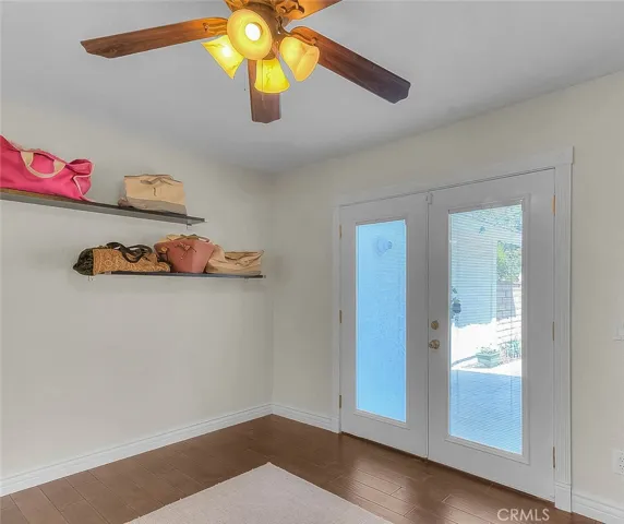 French doors to patio with blinds encased!