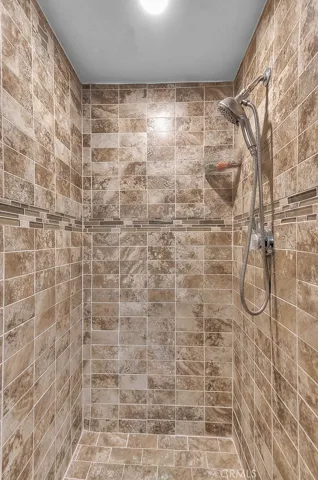 Beautiful, fully tiled shower & motion-activated lighting