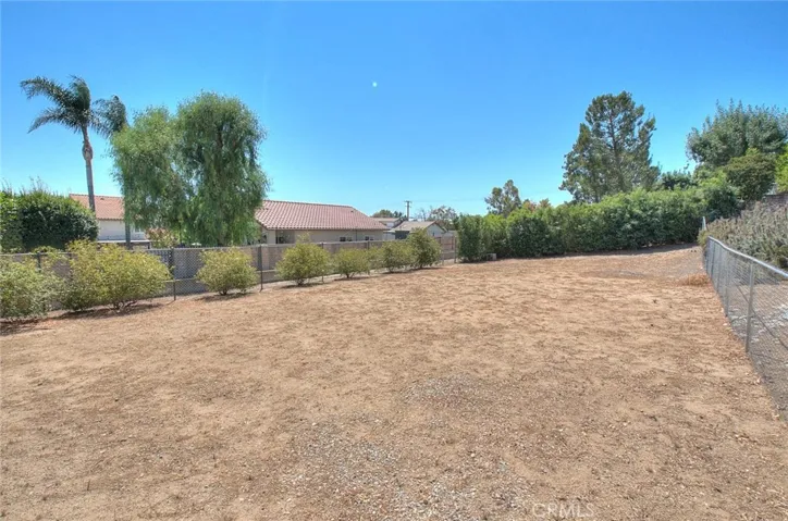 Remainder of the parcel, back lot is level @ trail
