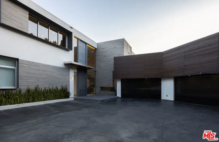 4 Car Garage with Uncovered Pa