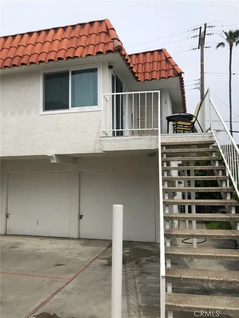 Upstairs with garages below. Upstairs with garages below.