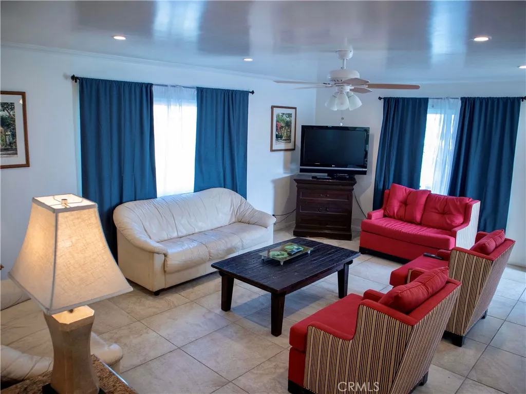 Family room has lots of windows with lots of natural light. Family room has lots of windows with lots of natural light.