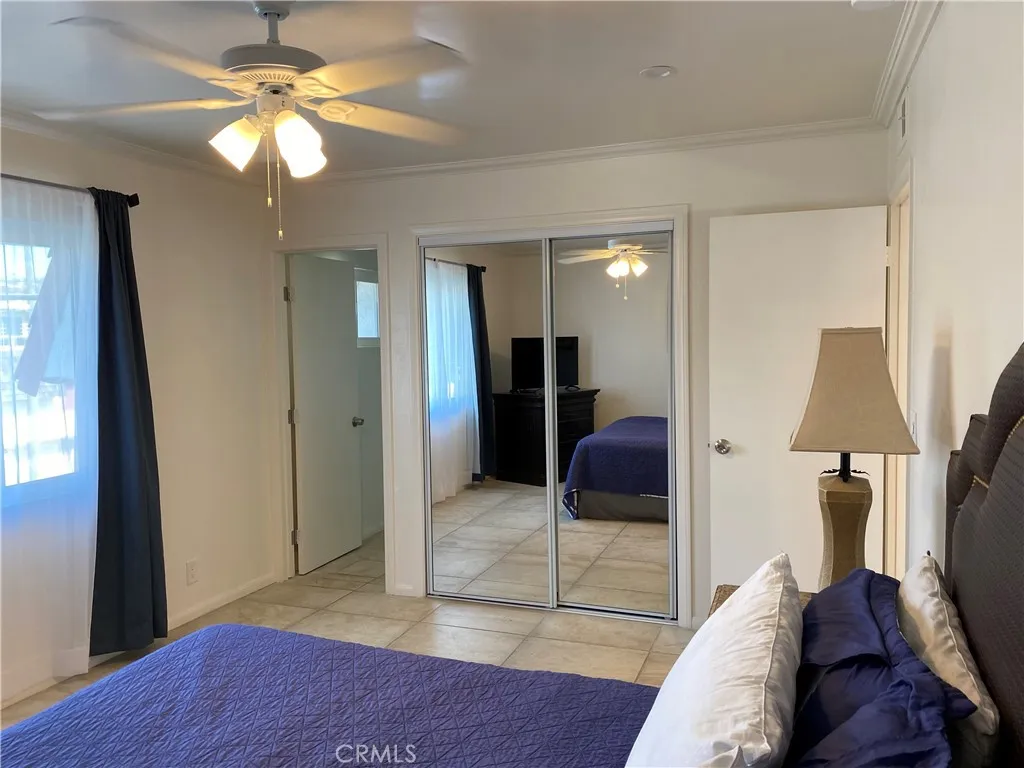 Primary bedroom with entrance to private bathroom. Primary bedroom with entrance to private bathroom.