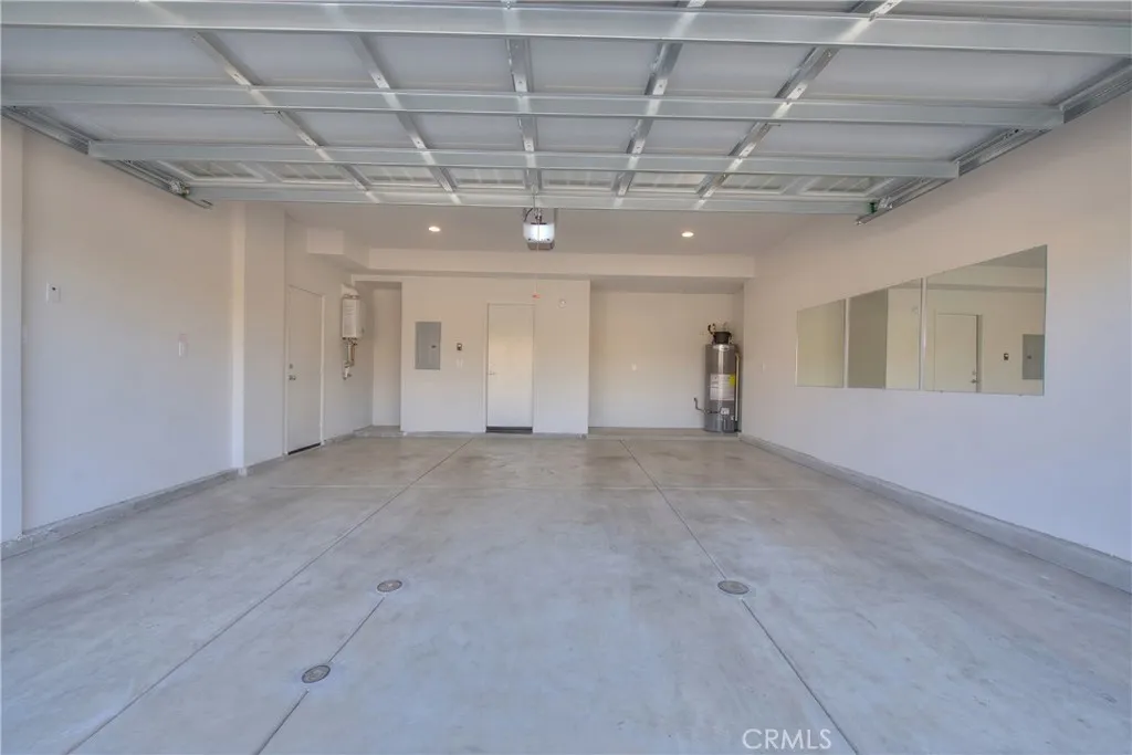 Attached garage offering convenient parking and additional storage space.