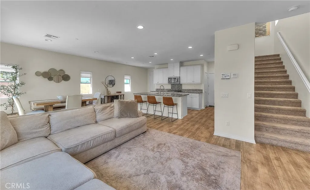 Open-concept living room offering a seamless flow into the adjoining areas.