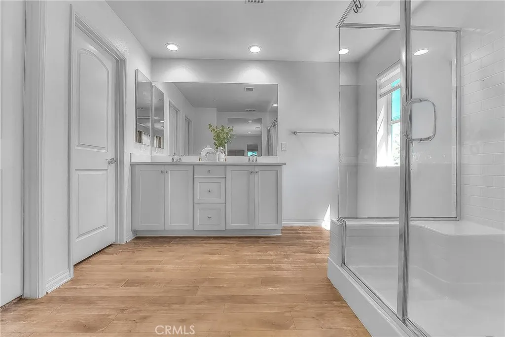 Modern walk-in shower offering a sleek and refreshing space.