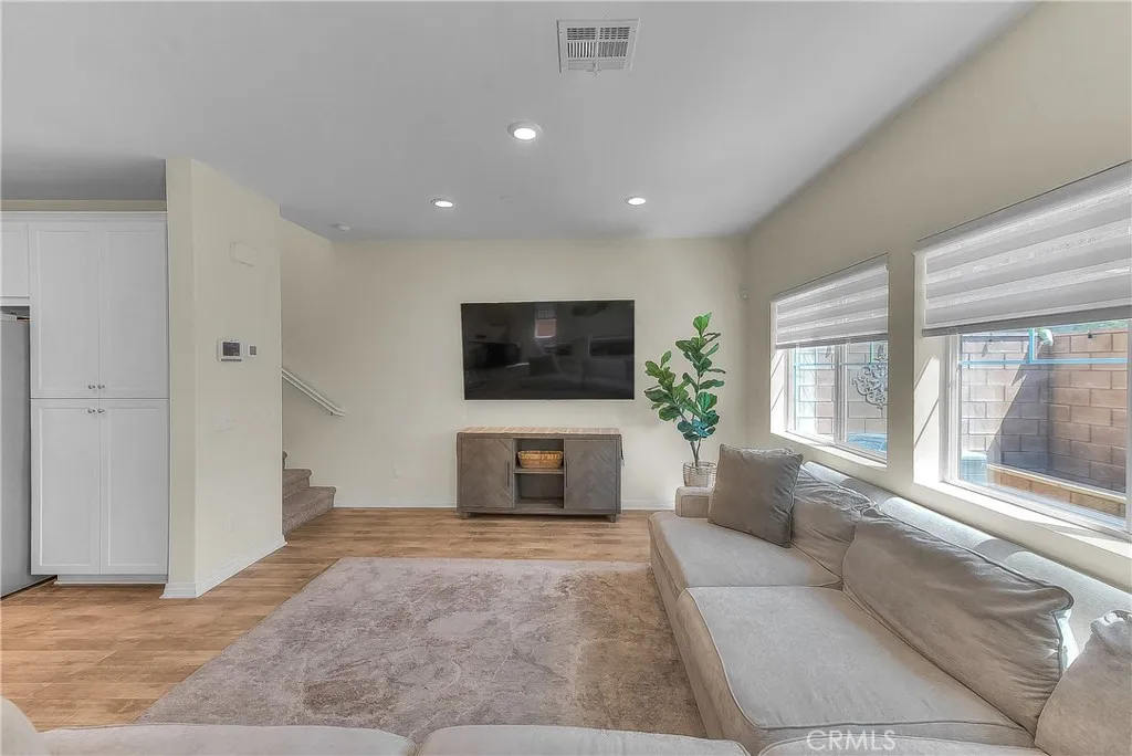 Stylish and comfortable living room that beautifully complements the home's contemporary design