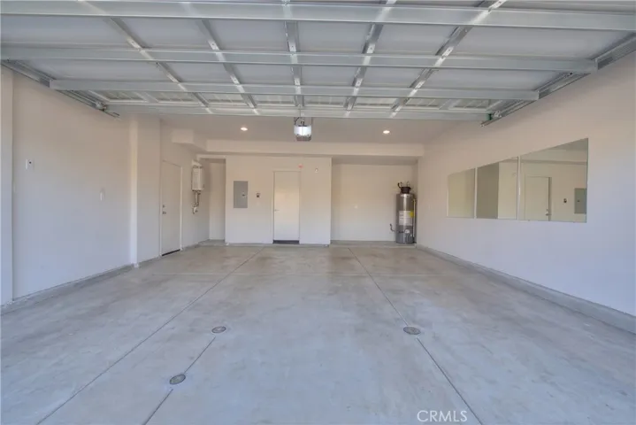 Attached garage offering convenient parking and additional storage space.