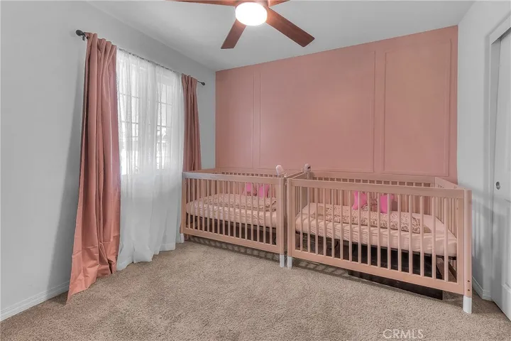 Bright and inviting Bedroom 2 offering comfortable space and a welcoming atmosphere.