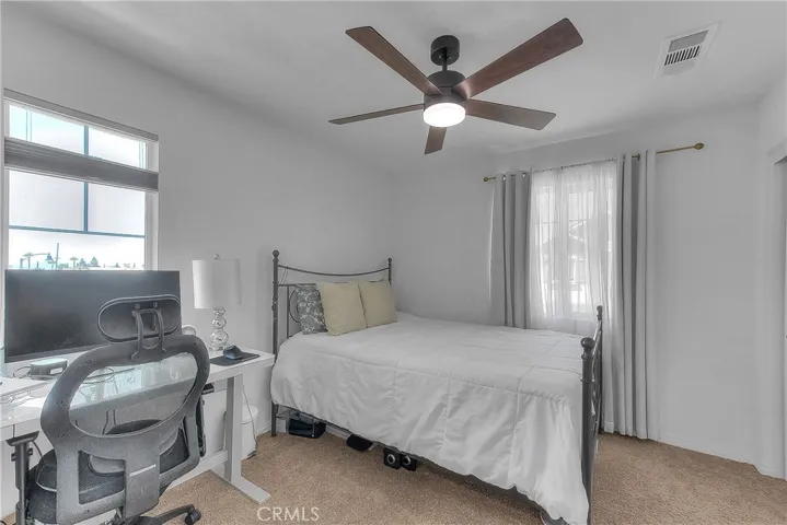 Bedroom 4 is thoughtfully positioned to provide flexible living space for guests, family, work, or hobbies.