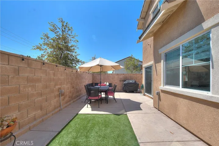 Private, easy-care backyard offering a pleasant outdoor retreat.