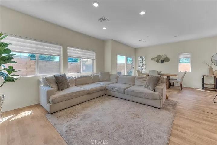 Bright and inviting living room with an open, comfortable layout perfect for relaxing and entertaining.