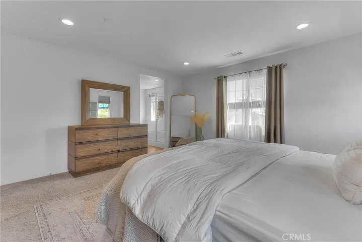 Bright and stylish master bedroom designed for comfortable everyday living.