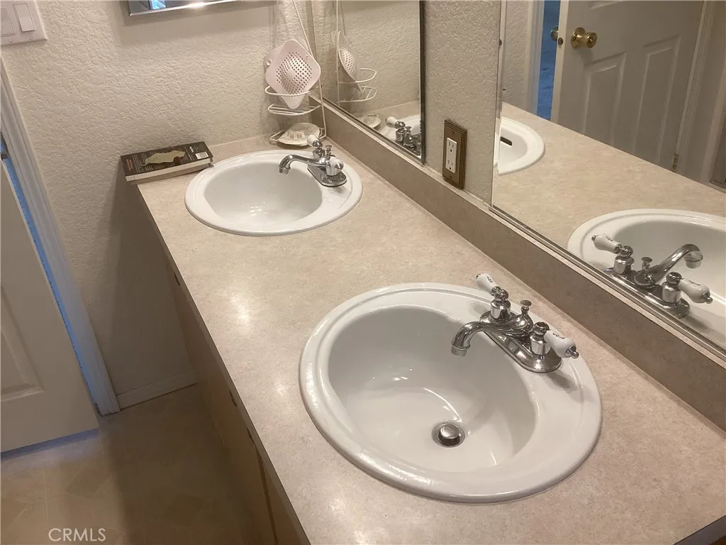 With double sinks, soaking tub and shower.