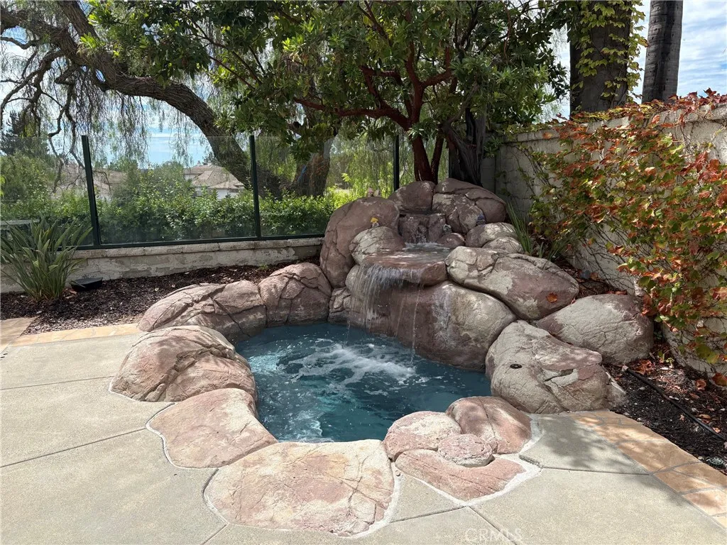 Water feature spills into your Private Saltwater Spa Water feature spills into your Private Saltwater Spa