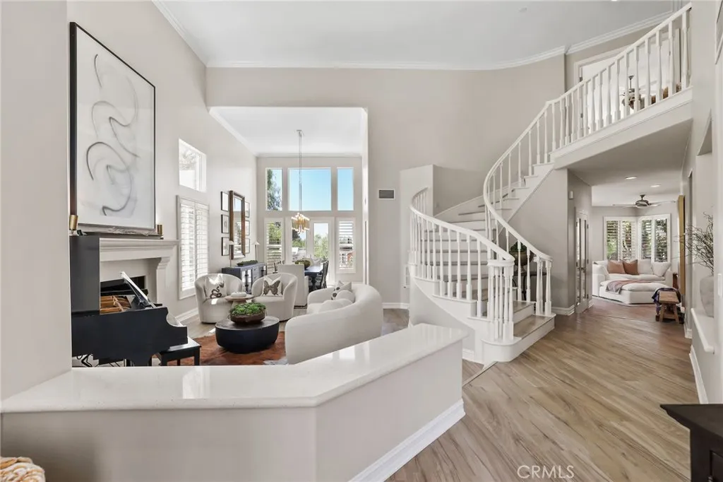 Sweeping Staircase greets you in Foyer Sweeping Staircase greets you in Foyer
