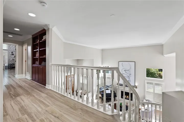 Long hallway separates from the other 3 upstairs bedrooms