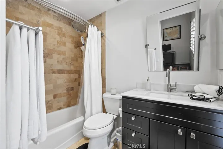 Main Floor Ensuite Bath, accessible to side yard