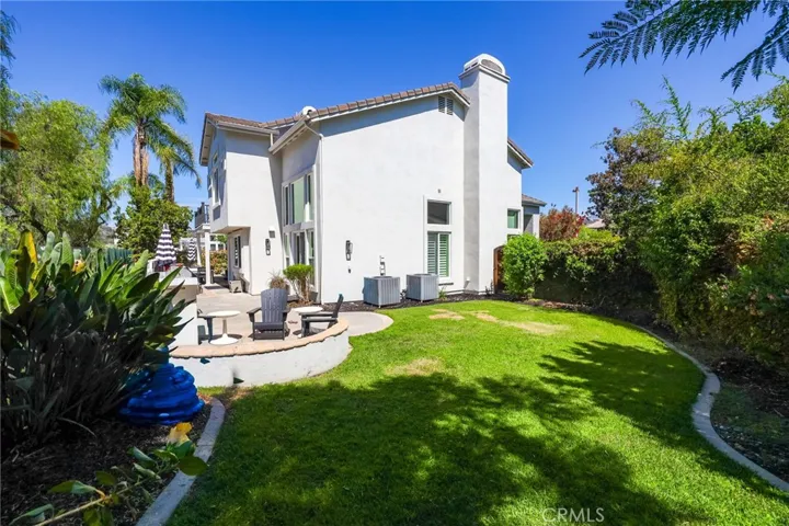 Lushly landscaped private yard with plenty of room to roam