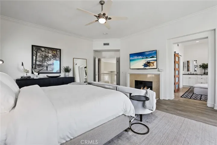 Enjoy the fireplace in the spacious primary suite