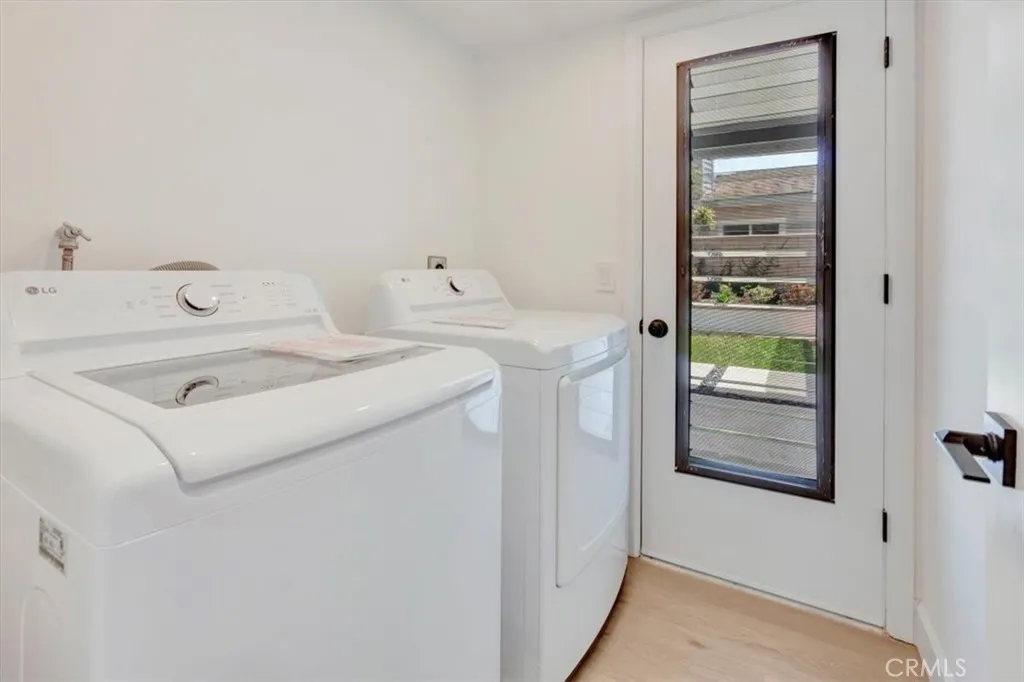 Laundry Room with NEW Washer/Dryer Included
