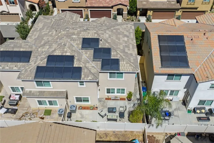 Aerial view of subject property and neighboring properties.