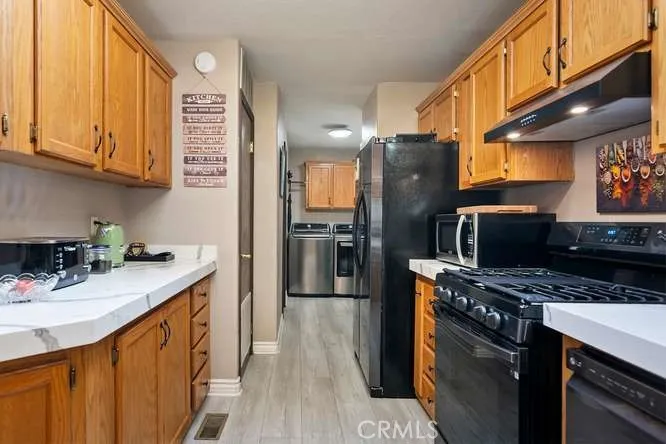 Kitchen and Adjacent Laundry