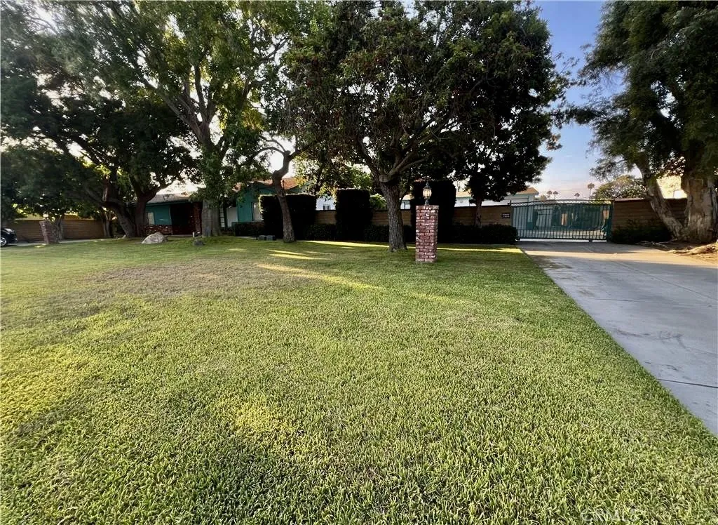 Driveway 2 on right with gated entrance to garage in back