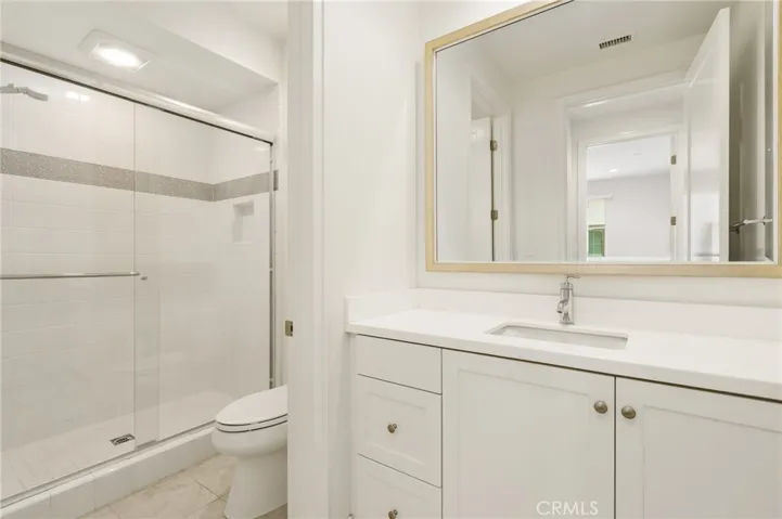 1st floor bathroom with a shower