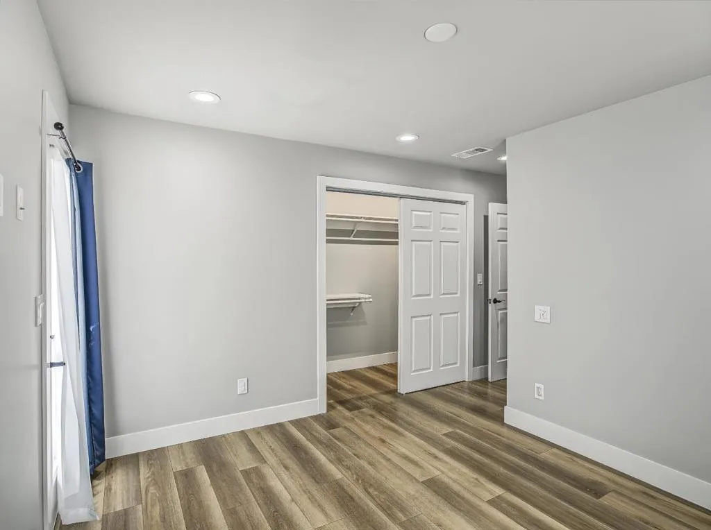 Sliding door closets have recess lites. Sliding door closets have recess lites.