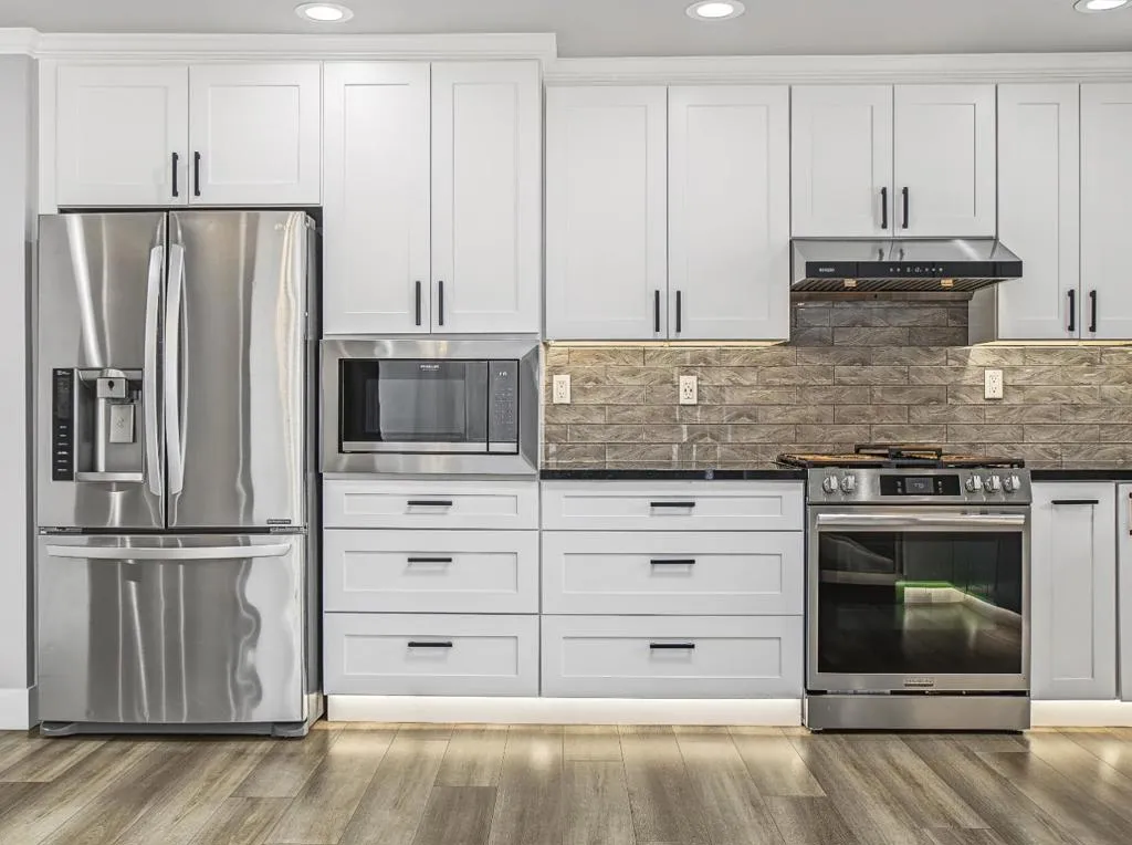 Newer Stainless steel Fridge with Ice maker and Water line. Gas stove with Griddle & Microwave. Newer Stainless steel Fridge with Ice maker and Water line. Gas stove with Griddle & Microwave.