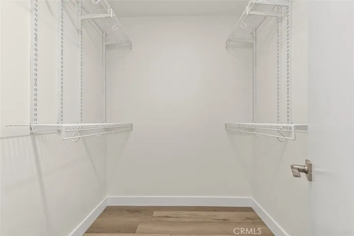 Primary walk-in closet.