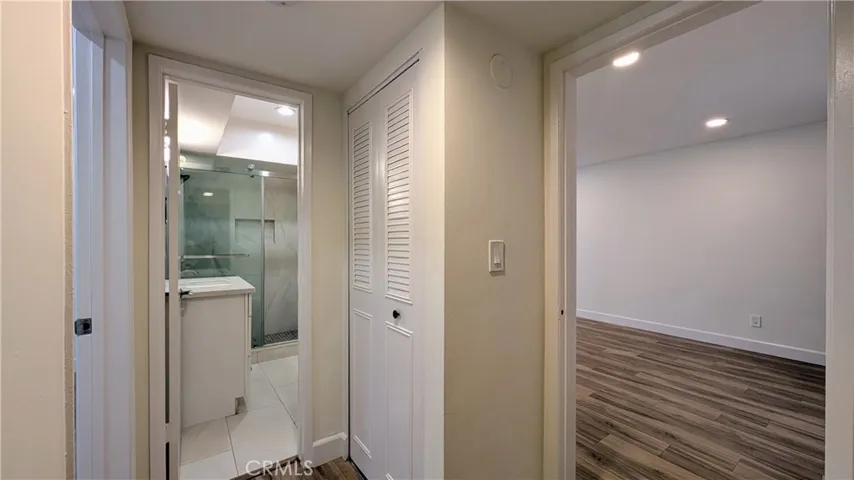 Hallway with linen closet