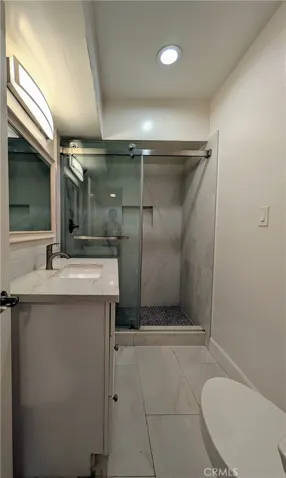 Newer Hallway Bathroom with large step in shower
