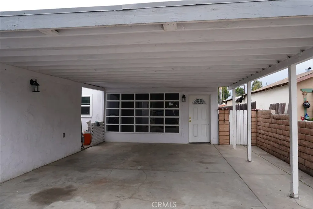 front of unit and carport