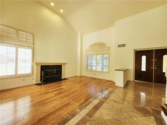  
Living Room with Vault Ceiling and Fireplace