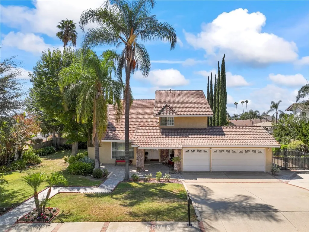 Street View of Home with mature trees, tile roof, 3 car garage and gated RV Parking Street View of Home with mature trees, tile roof, 3 car garage and gated RV Parking