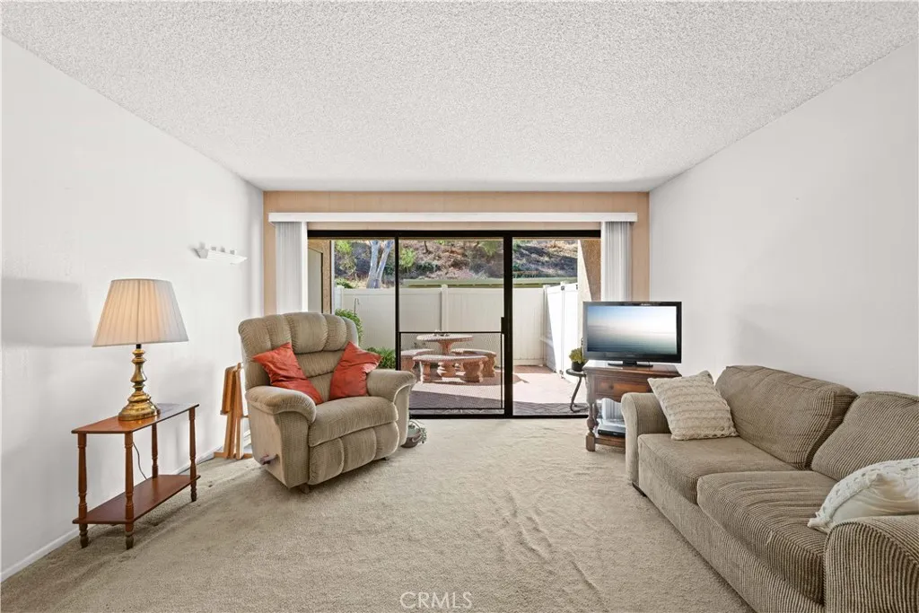  Living room with slider access to private patio