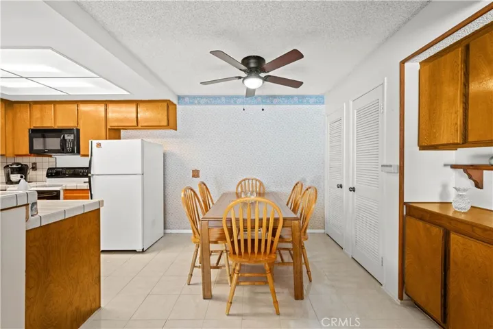 Kitchen opens to dining area