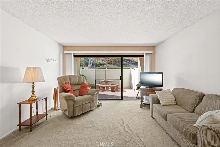  Living room with slider access to private patio