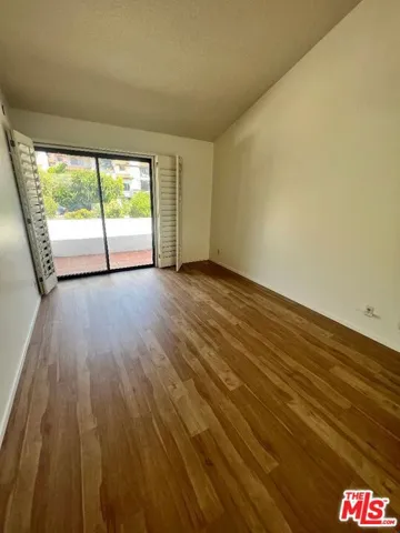 2nd bedroom with a large balco