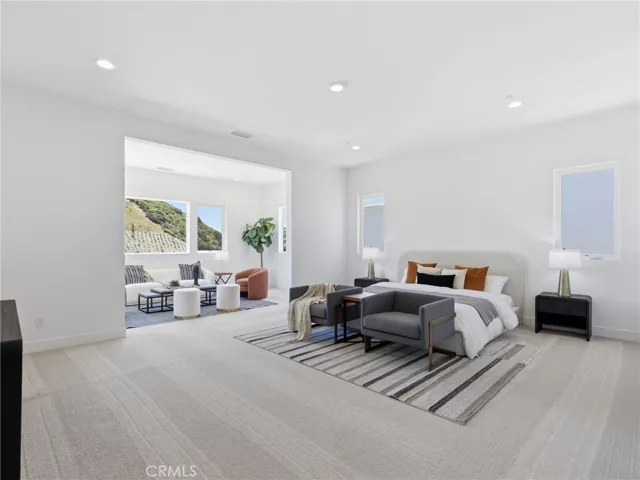 Primary Bedroom and Retreat: Fernwood - The Ridge Collection at Bella Vista - Photo of another Fernwood - Not actual home for sale - Homesite 81 is still under construction