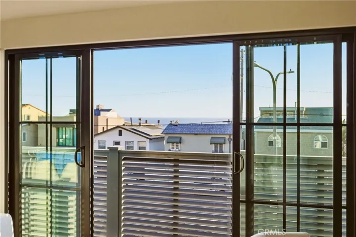 Open the doors and get that ocean breeze! Only 1 block from the sand!
